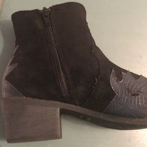 Free people suede boots with unique trim.